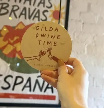 Beer mat inside Plates and Grapes
